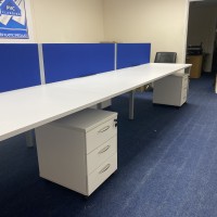 Rayleigh bench desk with mobile pedestals ands blue dividers